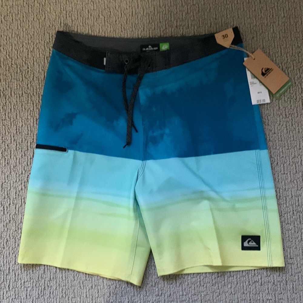 Young men’s Quick Silver Bathing suit . New with tags.